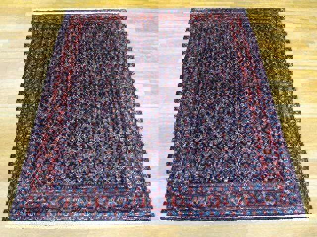 «ماهی درهم» نقشی که تاریخ را می‌بافد؛ راز کهن در تار و پود قالی کردی